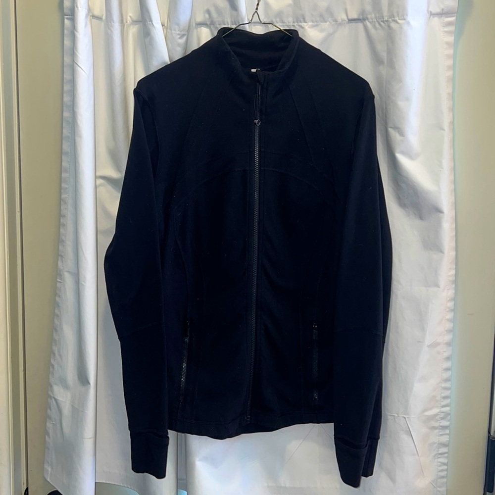 Black Women’s Lululemon full-zip jacket.